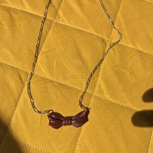 Elegant Gold and Brown Bow Necklace